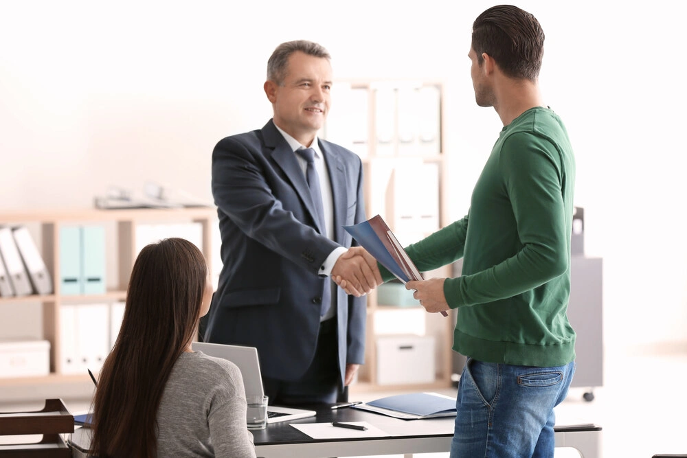 Lawyer shaking hands with a client